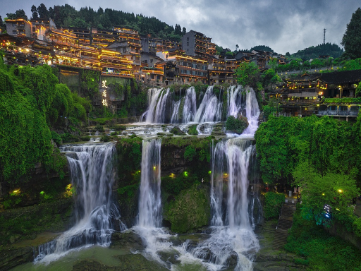 Waterfall stilt houses 瀑布吊脚楼